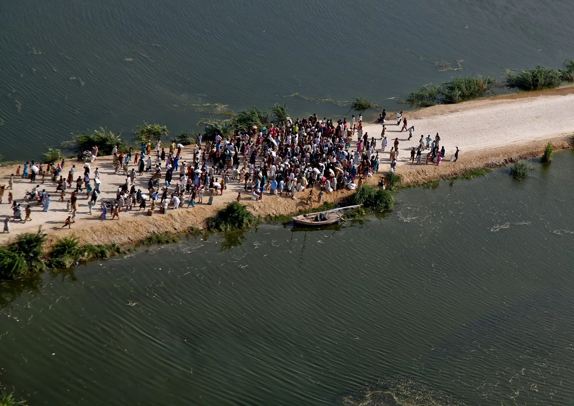 Emergency tents beside floodwaters in rural Pakistan